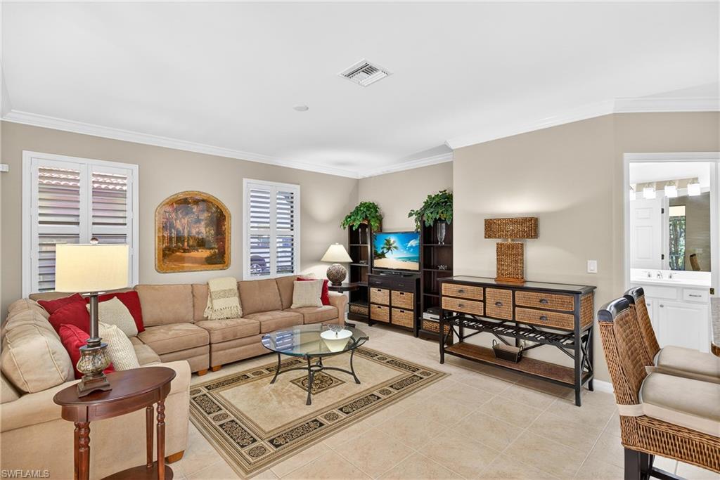 1248 Manado Drive Naples, FL 34113 - Photo 8 of 45 a living room with furniture