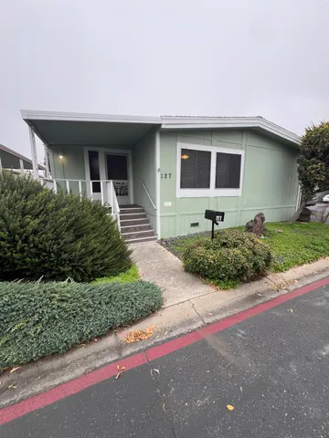 a front view of house with yard