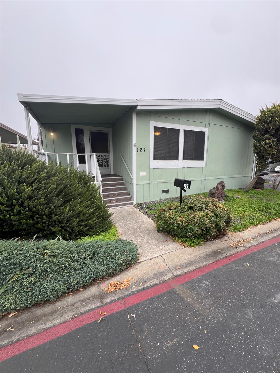 a front view of house with yard