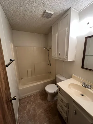 a view of a backyard with a garden and plants