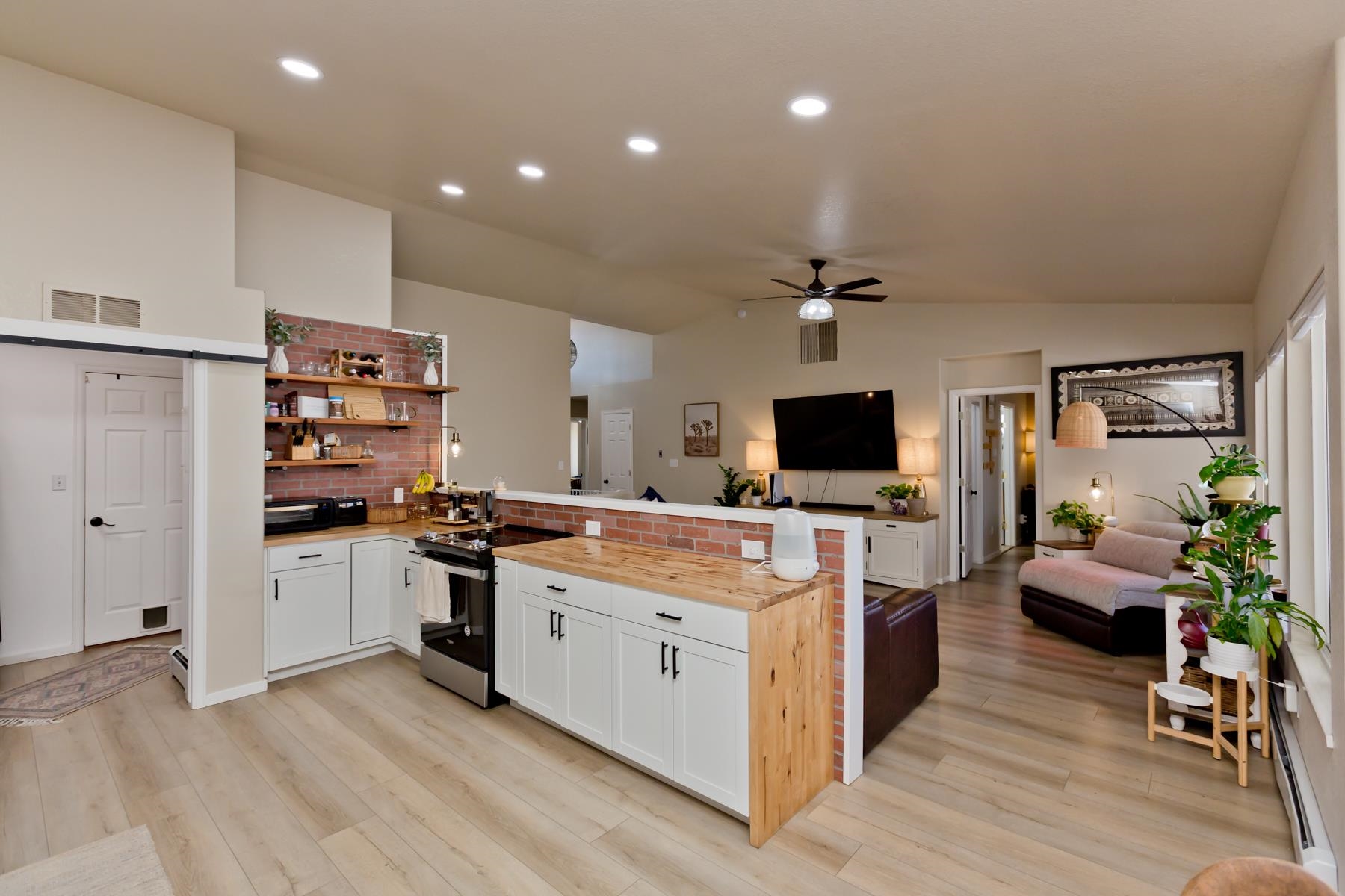 528 Park Ridge Court Grand Junction, CO 81507 - Photo 11 of 42 a large kitchen with stainless steel appliances granite countertop a stove and cabinets