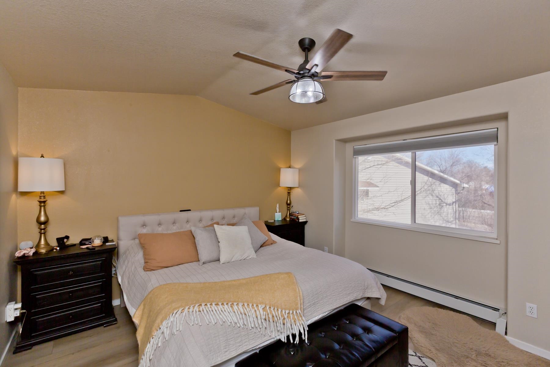 528 Park Ridge Court Grand Junction, CO 81507 - Photo 16 of 42 a bedroom with a bed and a window