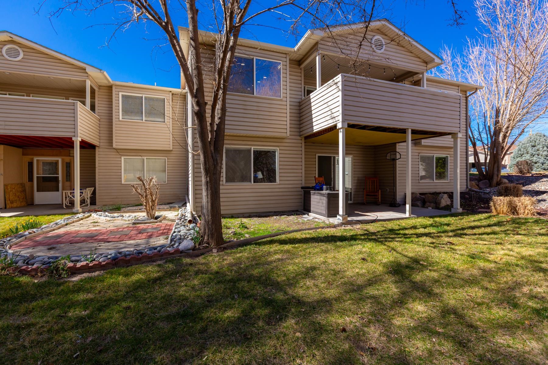 528 Park Ridge Court Grand Junction, CO 81507 - Photo 39 of 42 a front view of a house with garden