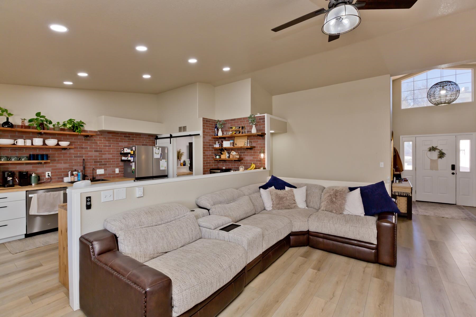 528 Park Ridge Court Grand Junction, CO 81507 - Photo 7 of 42 a living room with furniture and wooden floor