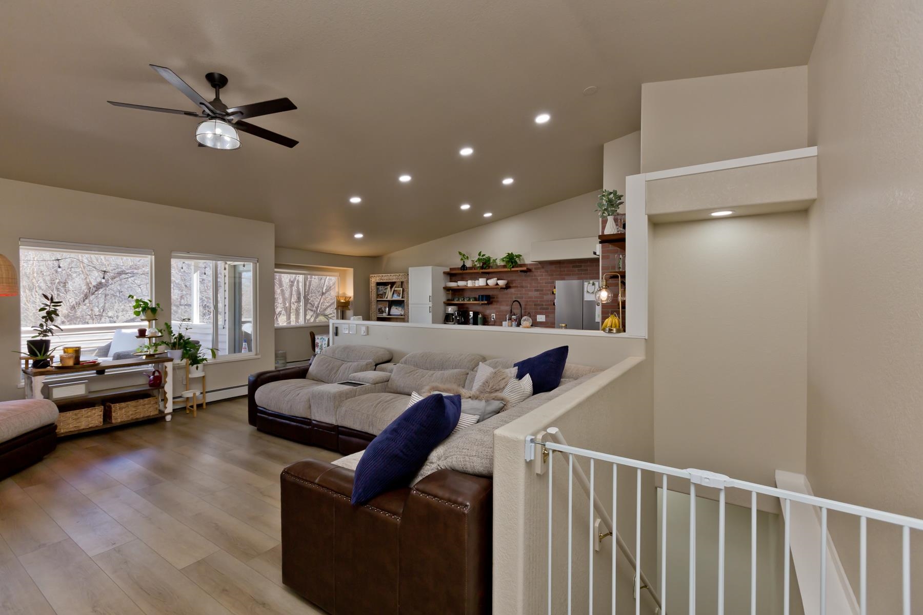 528 Park Ridge Court Grand Junction, CO 81507 - Photo 9 of 42 a view of a livingroom with furniture and a ceiling fan