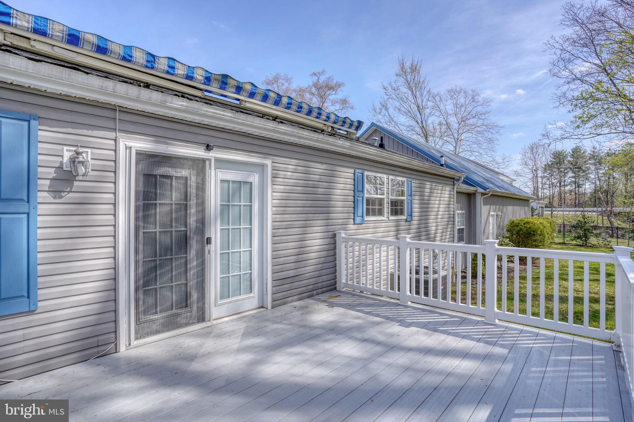 31729 West Edge Road Millington, MD 21651 - Photo 34 of 60 Back patio with awning