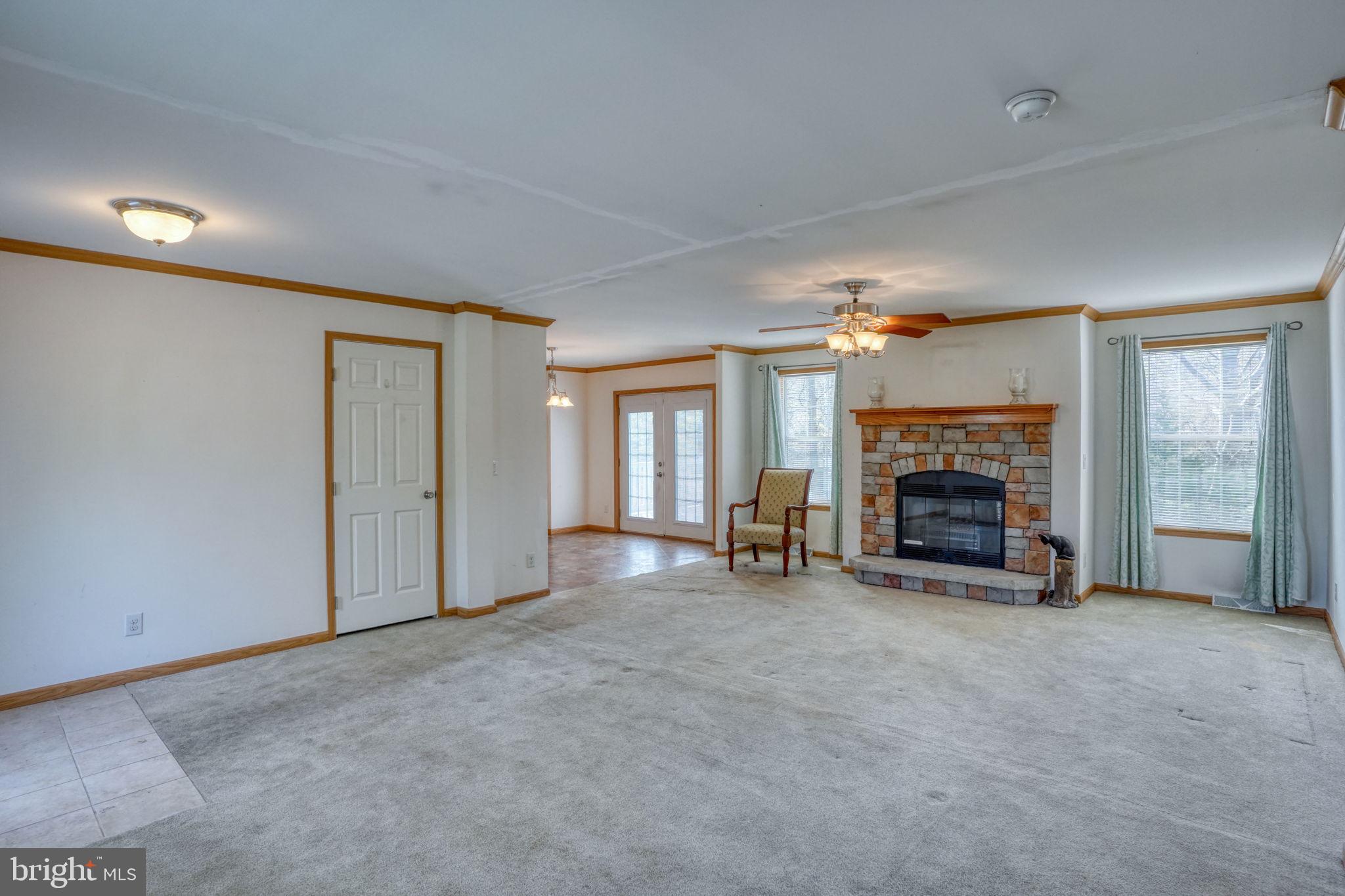 31729 West Edge Road Millington, MD 21651 - Photo 7 of 60 Living room with fireplace