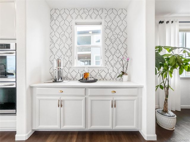 a potted plant sitting on top of a kitchen