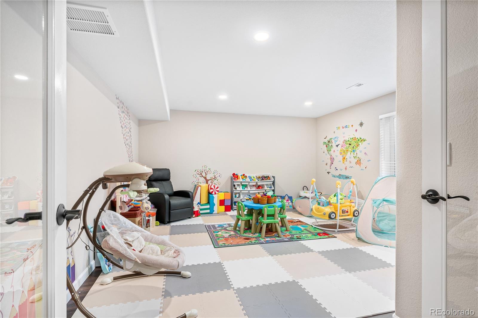 16391 Buffalo Run Drive Commerce City, CO 80022 - Photo 35 of 49 a view of kids room with toys and toys