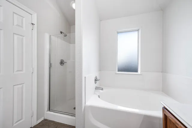 a view of an empty walk in closet