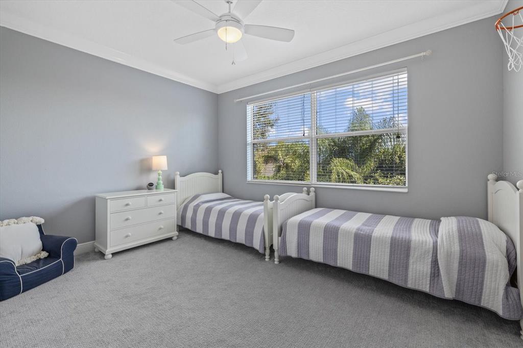 4727 Balboa Park Loop Bradenton, FL 34211 - Photo 36 of 56 a bed room with a bed and a window