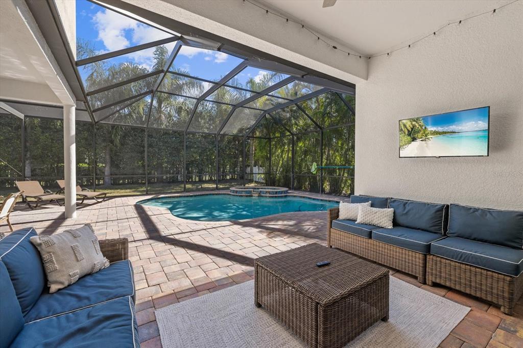 4727 Balboa Park Loop Bradenton, FL 34211 - Photo 39 of 56 a living room with furniture and a yard