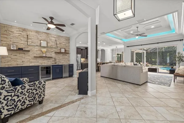 a kitchen with stainless steel appliances granite countertop a stove and cabinets