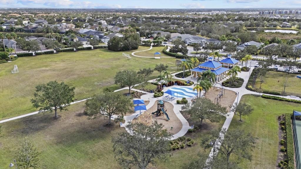 4727 Balboa Park Loop Bradenton, FL 34211 - Photo 54 of 56 an aerial view of residential houses with outdoor space