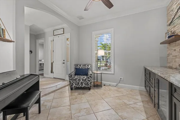 a living room with furniture and a window