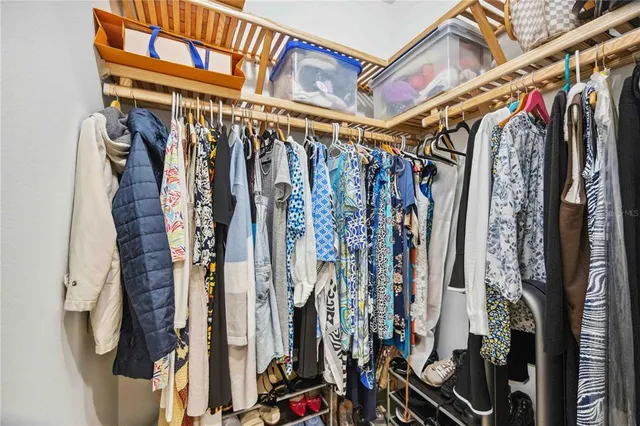a white bath tub sitting next to a white sink