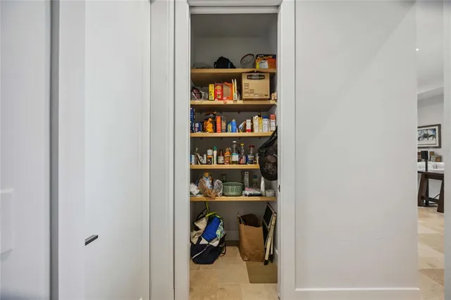 a room with furniture and a flat screen tv