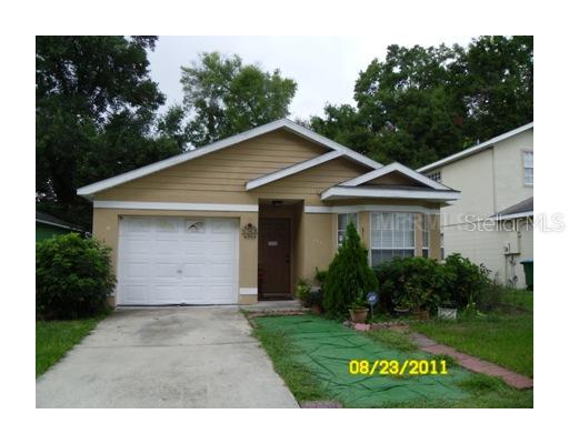 131 Oak Grove Road Winter Park, FL 32789 - Photo 1 of 1 a front view of a house with garden