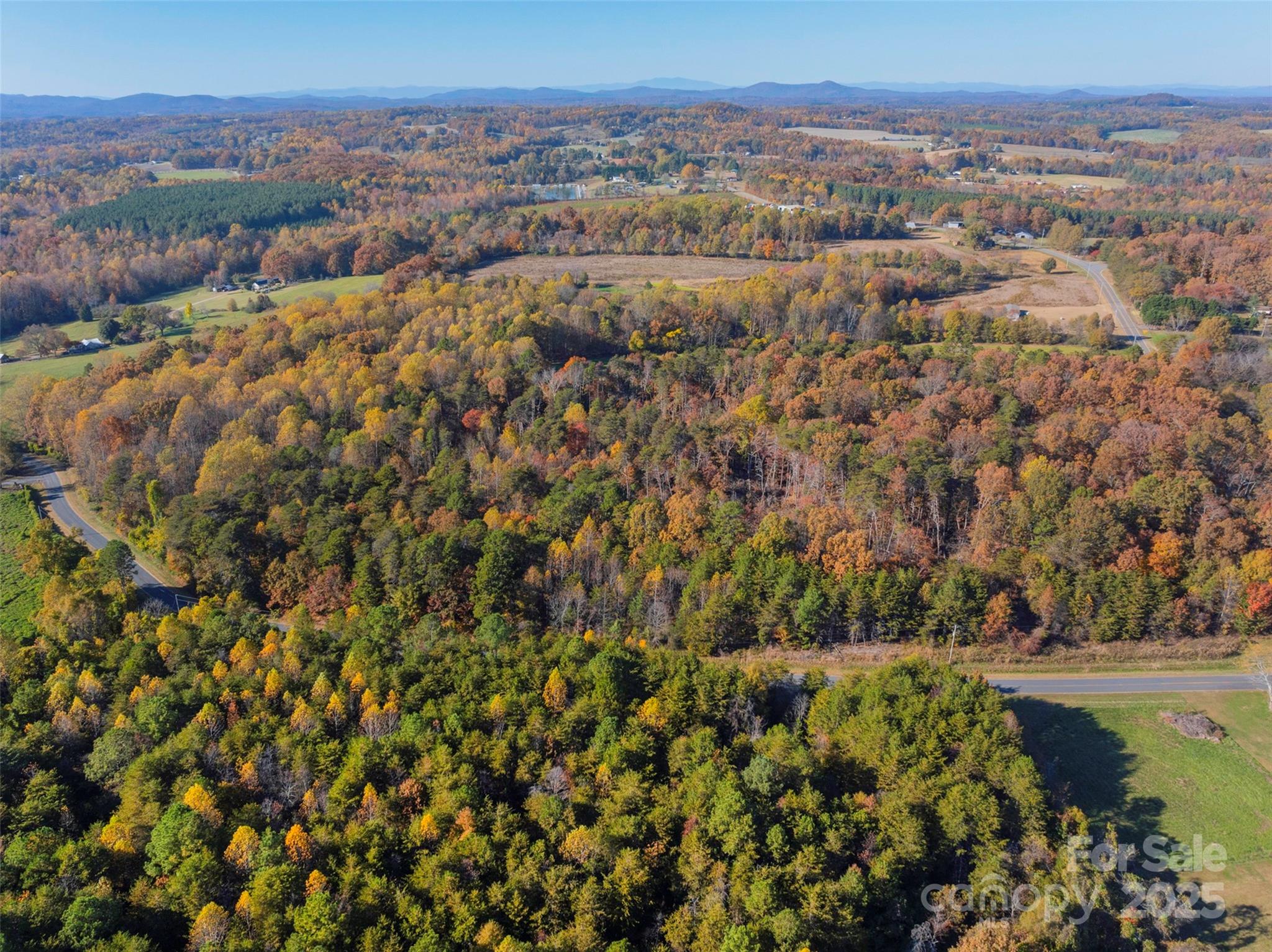 0 Bud Davis Road, Unit 2 Vale, NC 28168 - Photo 10 of 28 an aerial view of residential house with parking and trees