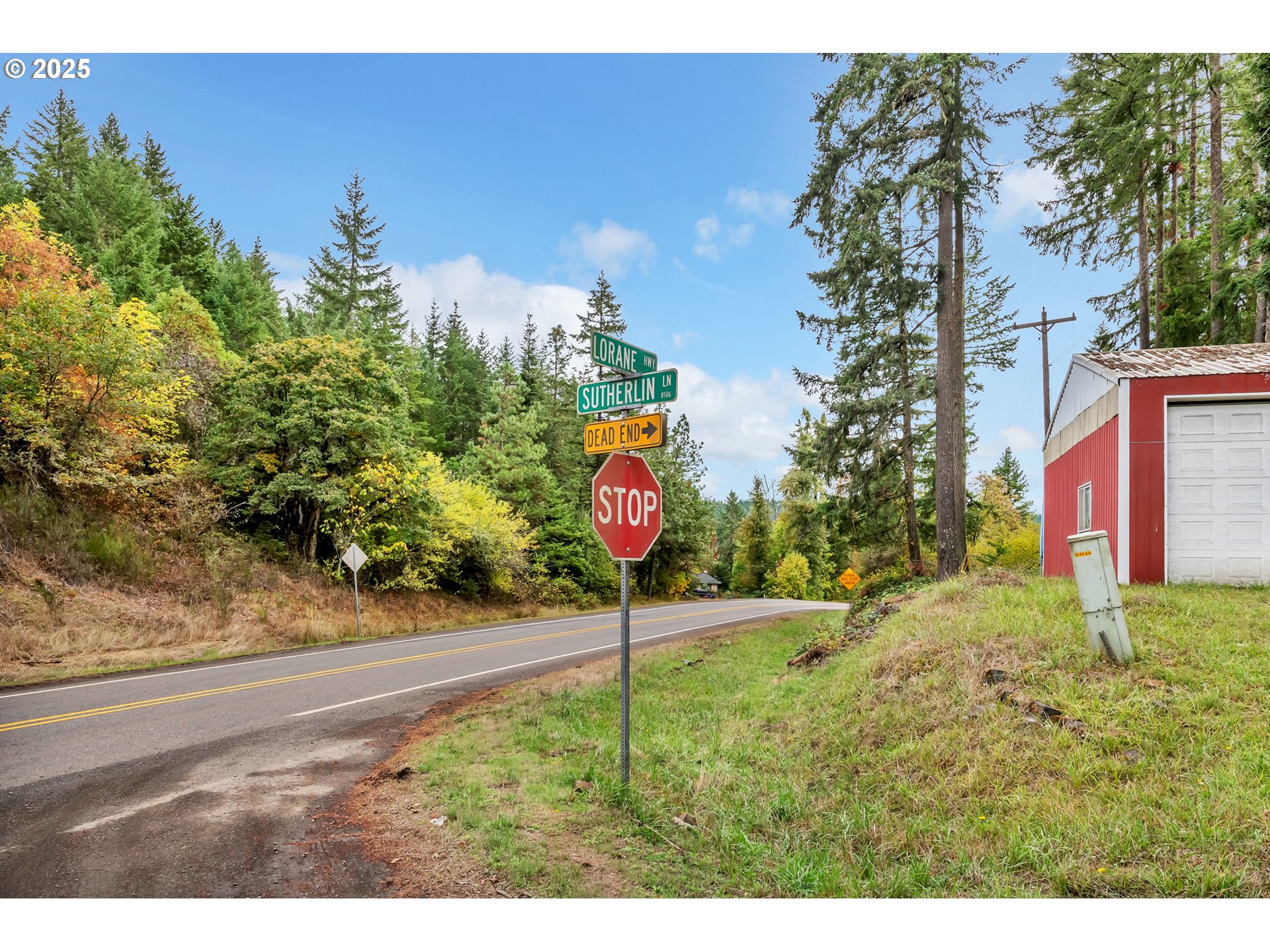 0 Sutherlin Lane, Unit 1100 Eugene, OR 97405 - Photo 36 of 42 a street sign on the side of the road
