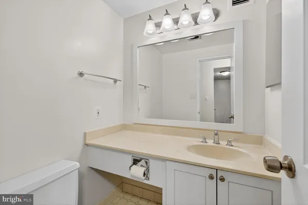 a bathroom with a sink and a toilet