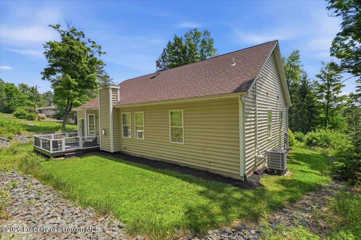 99 Hilltop Road Waverly, PA 18471 - Photo 41 of 41 a view of a house with a backyard