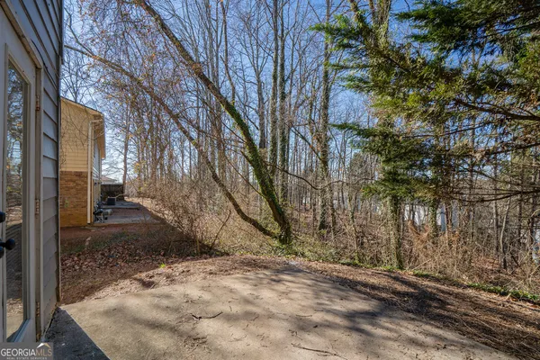 a view of a backyard of the house