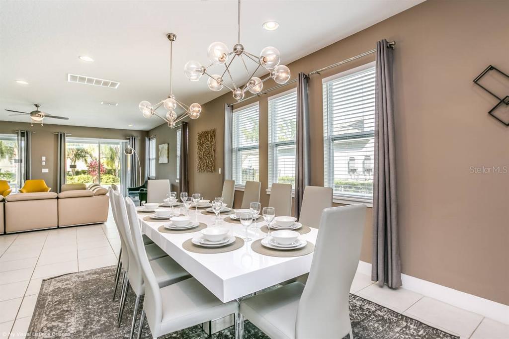 7736 Graben Street Kissimmee, FL 34747 - Photo 58 of 62 a view of a dining room and livingroom view