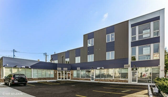 3620 West Irving Park Road, Unit 2F Chicago, IL 60618 - Photo 1 of 1 a view of a building with a street