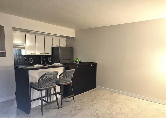 a view of a room that has a window