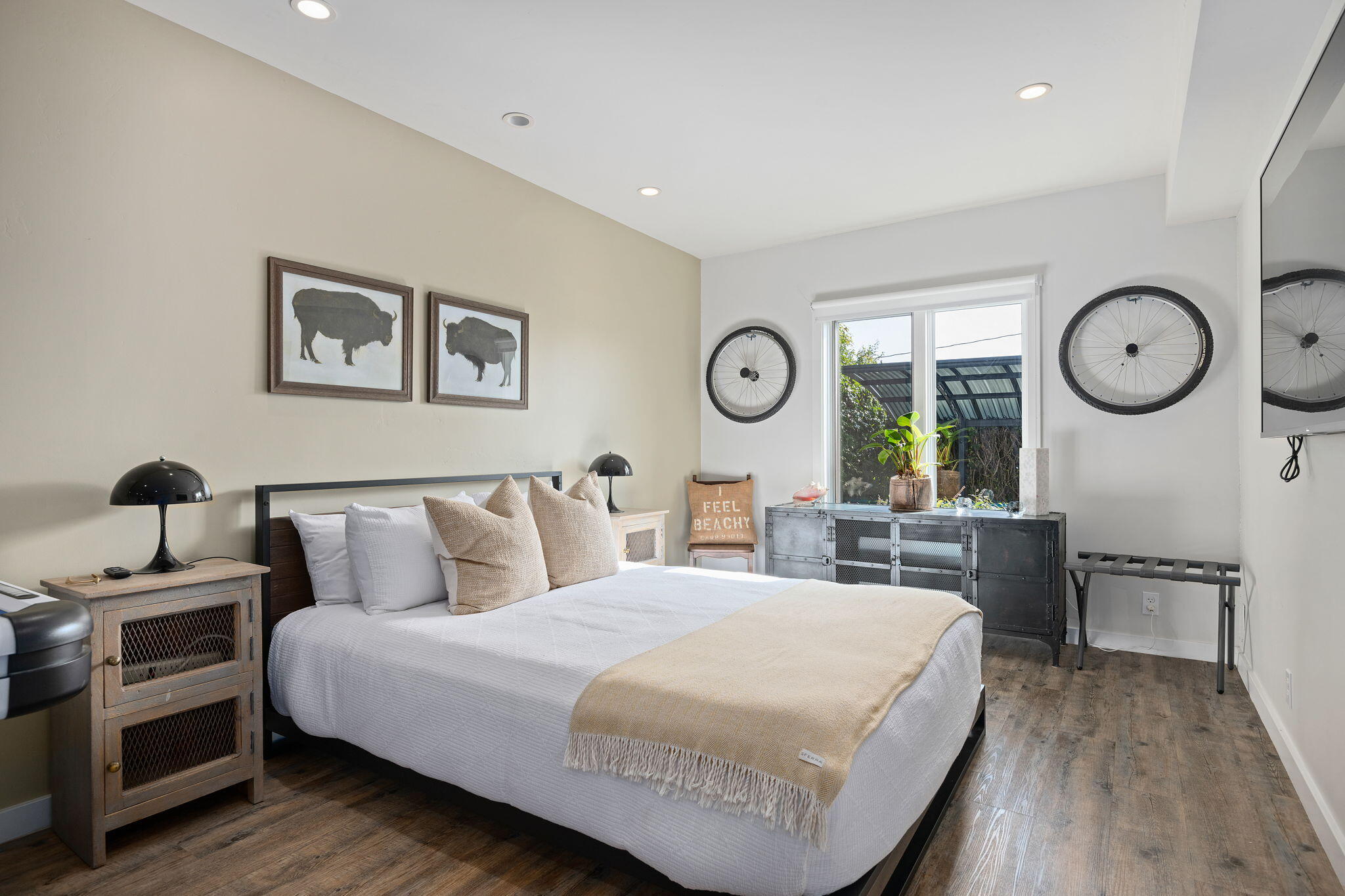 2290 Whitney Avenue Summerland, CA 93067 - Photo 19 of 28 a bedroom with a bed a mirror and a window