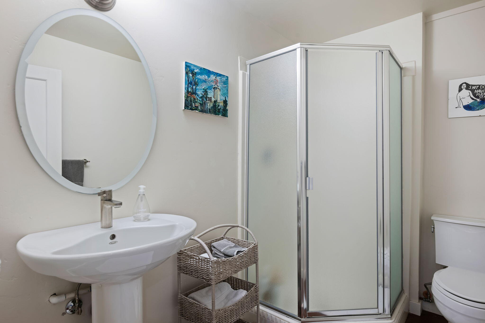 2290 Whitney Avenue Summerland, CA 93067 - Photo 21 of 28 a bathroom with a sink a toilet and a mirror
