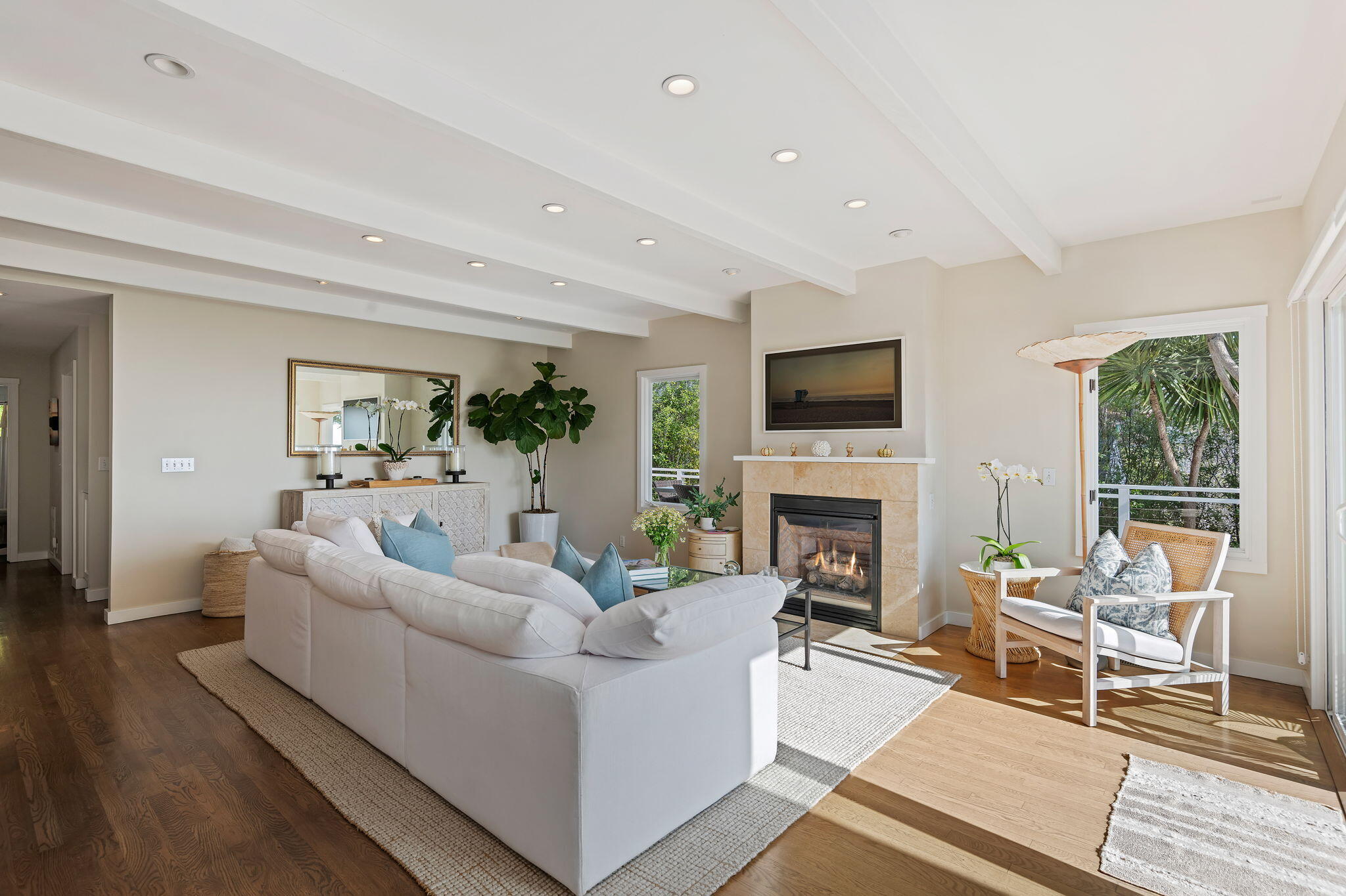 2290 Whitney Avenue Summerland, CA 93067 - Photo 4 of 28 a living room with furniture a fireplace and a floor to ceiling window