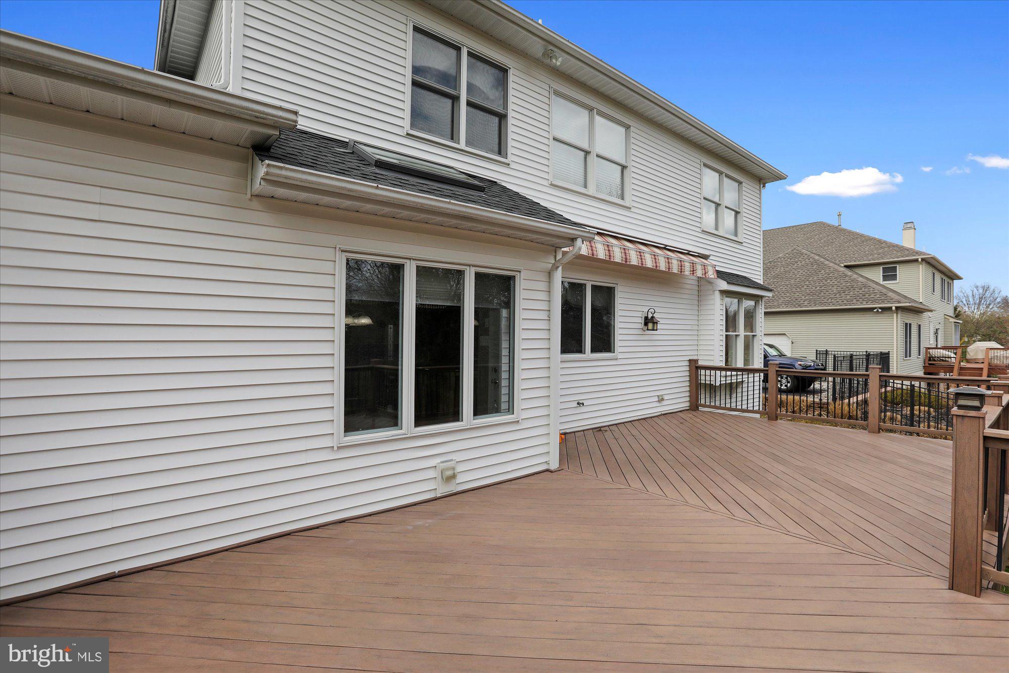 4815 Redfield Road Doylestown, PA 18902 - Photo 11 of 49 An Electric Awning Creates A Shaded Deck Area