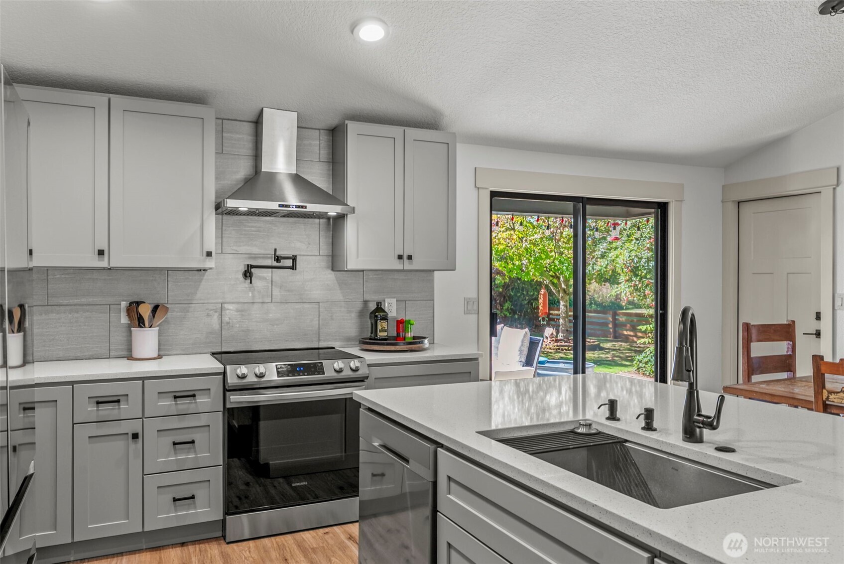 3167 Pacific Way Longview, WA 98632 - Photo 15 of 39 a kitchen that has a sink and a stove