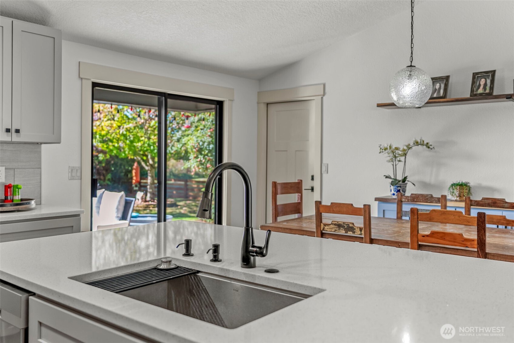 3167 Pacific Way Longview, WA 98632 - Photo 25 of 39 a kitchen with stainless steel appliances a sink a counter space and windows