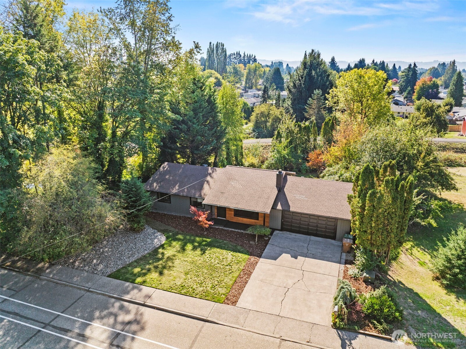 3167 Pacific Way Longview, WA 98632 - Photo 35 of 39 a view of a yard with an outdoor seating