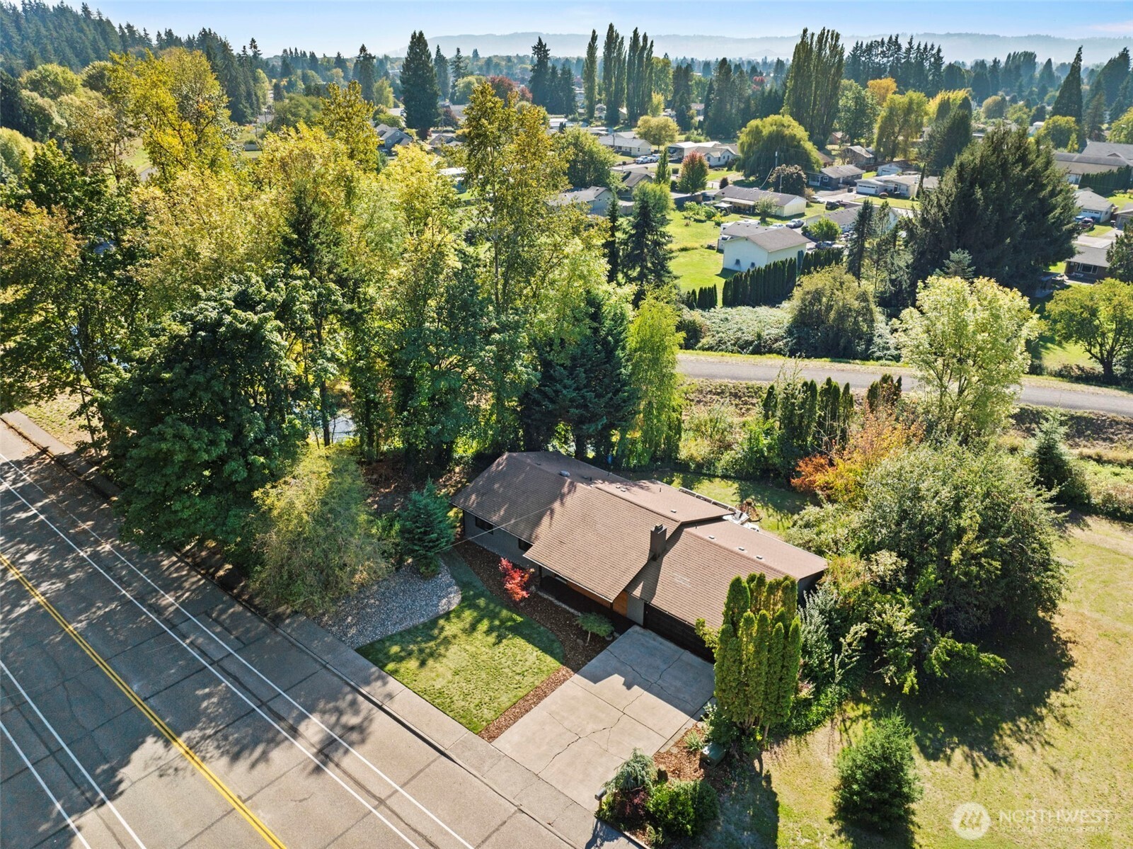 3167 Pacific Way Longview, WA 98632 - Photo 37 of 39 an aerial view of a house with a yard basket ball court and outdoor seating