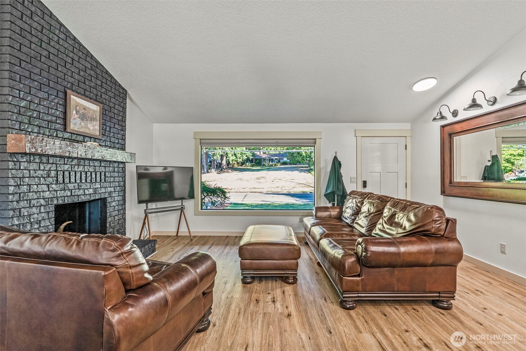 3167 Pacific Way Longview, WA 98632 - Photo 6 of 39 a living room with furniture and a fireplace
