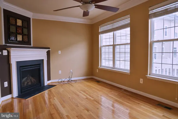 a bedroom with a bed and a fireplace
