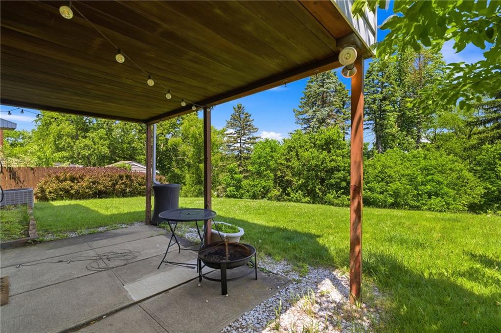 4883 East Willock Road Pittsburgh, PA 15227 - Photo 28 of 33 a view of a porch with furniture and garden