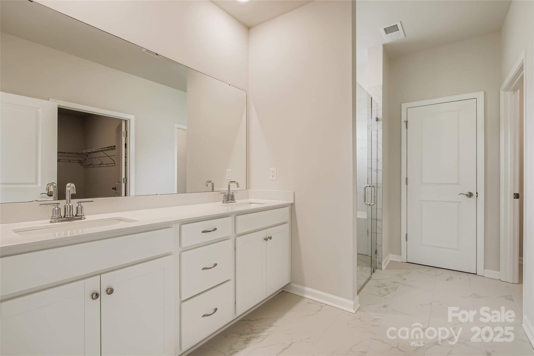 2803 Morning Song Way Lancaster, SC 29720 - Photo 9 of 18 a bathroom with double sink and a mirror