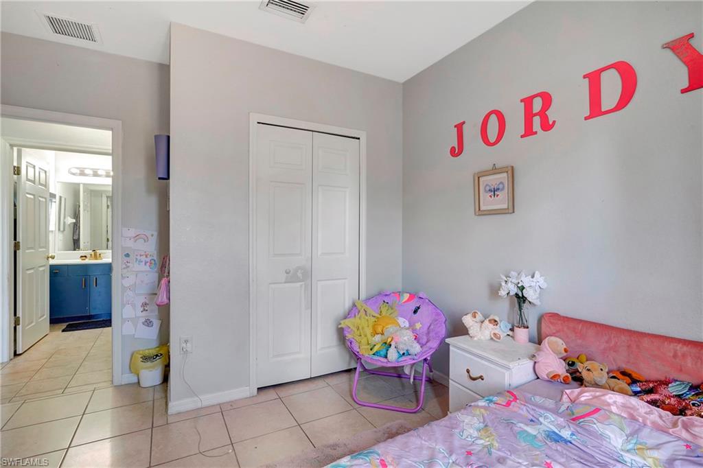 1565 Meadow Road Lehigh Acres, FL 33976 - Photo 8 of 32 a view of dining room with baby toys