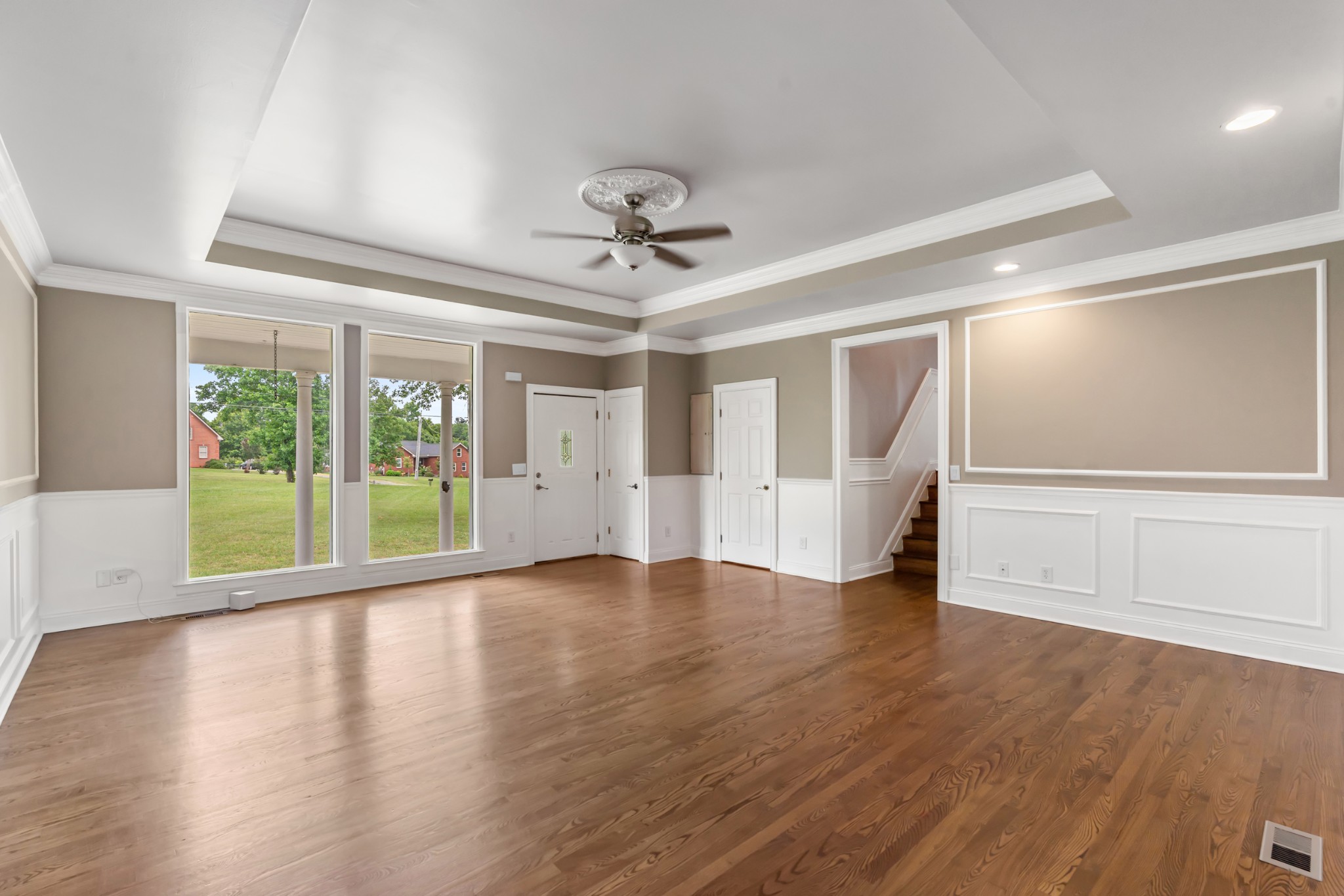 4602 Washington Road Springfield, TN 37172 - Photo 9 of 63 a view of an empty room with a window and wooden floor
