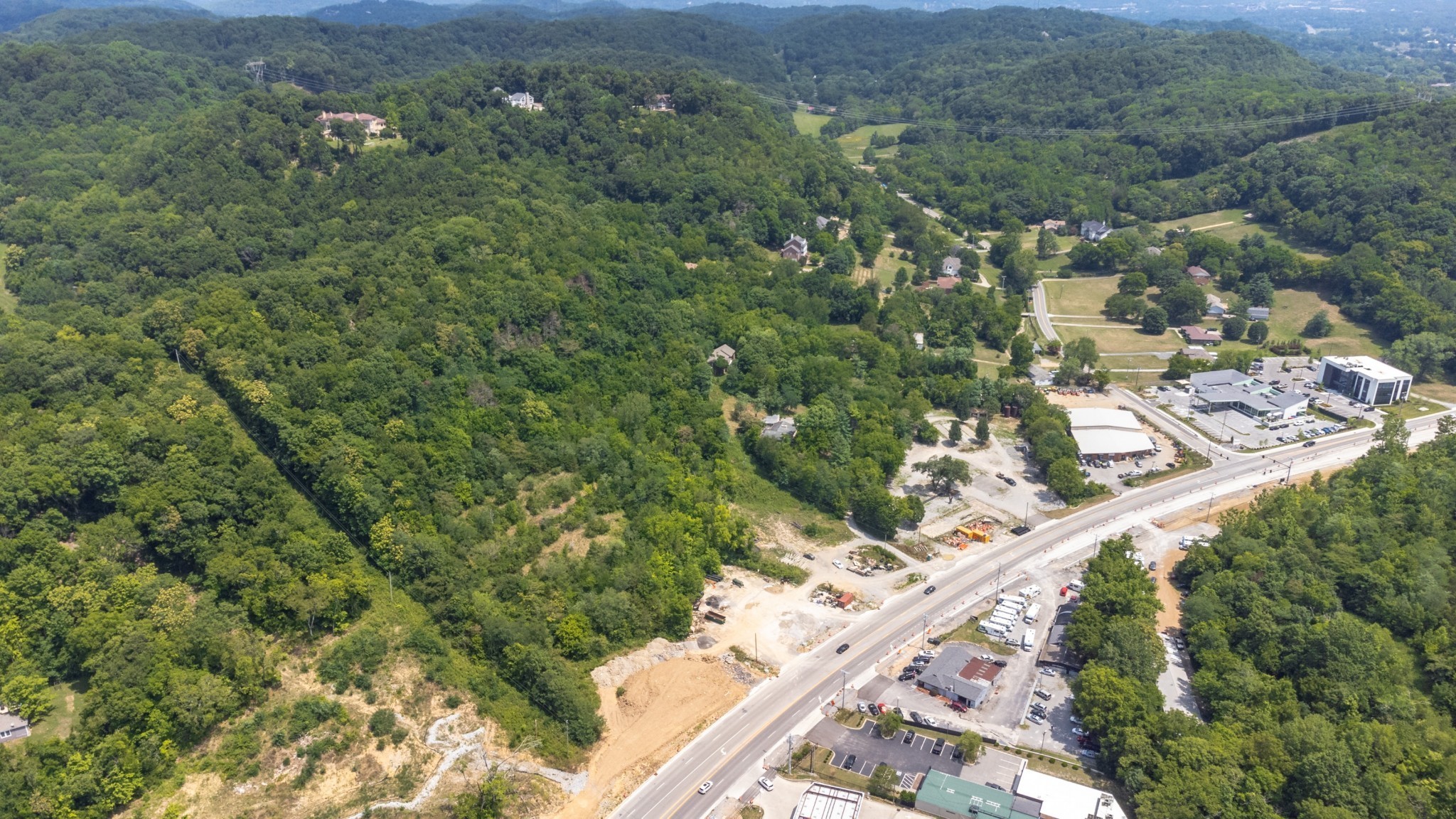 1605 Franklin Road Brentwood, TN 37027 - Photo 2 of 3 an aerial view of residential houses with outdoor space