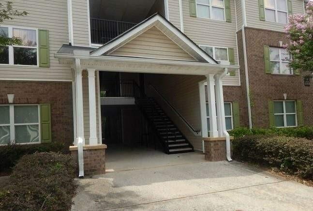 7204 Fairington Ridge Circle Lithonia, GA 30038 - Photo 1 of 1 a view of a house with wooden door