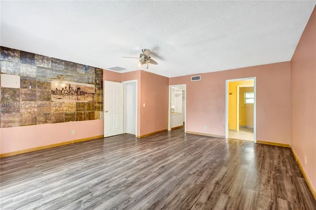 a bathroom with a double vanity sink and mirror