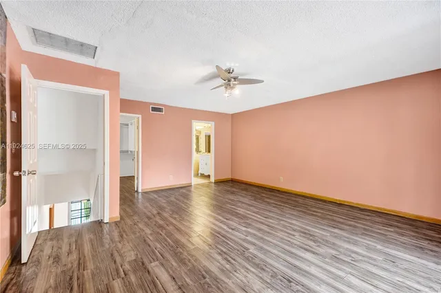 a view of multiple houses with a yard