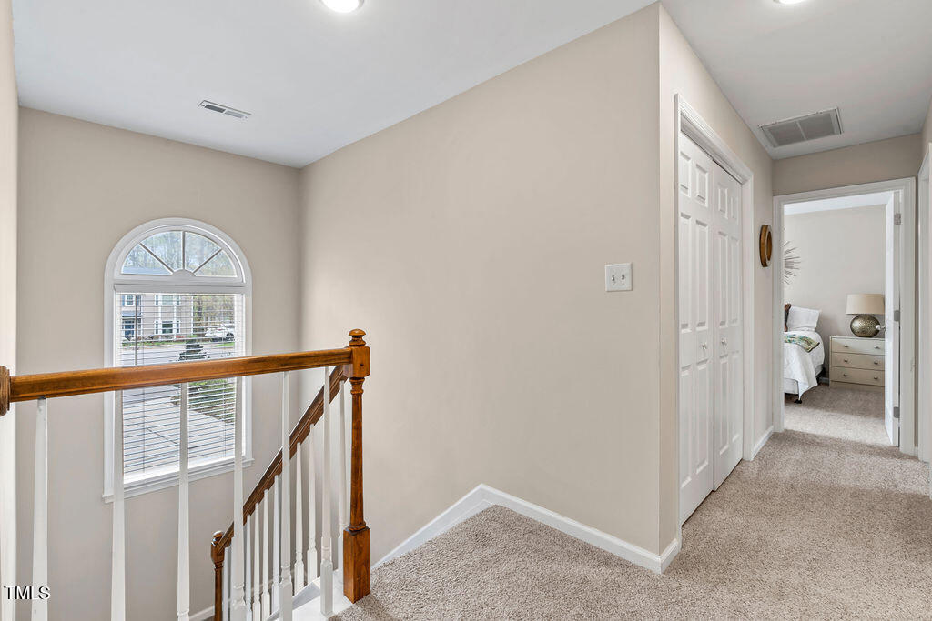 112 Oxpens Road Cary, NC 27513 - Photo 20 of 37 a view of front door with hallway