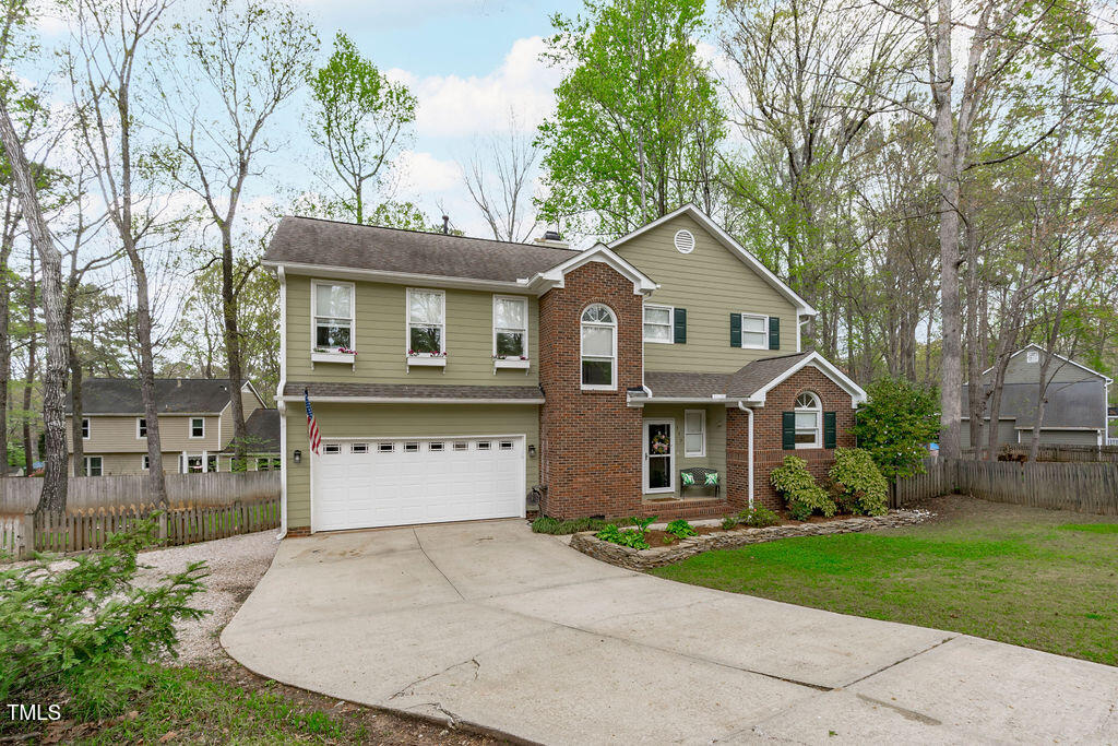 112 Oxpens Road Cary, NC 27513 - Photo 2 of 37 front view of a house with a yard